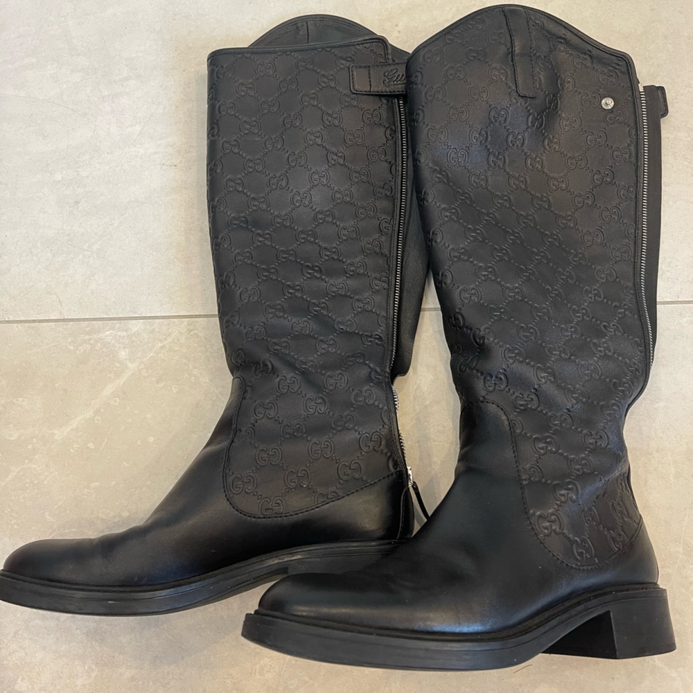 Gucci Knee High Monogram Guccissima boots.